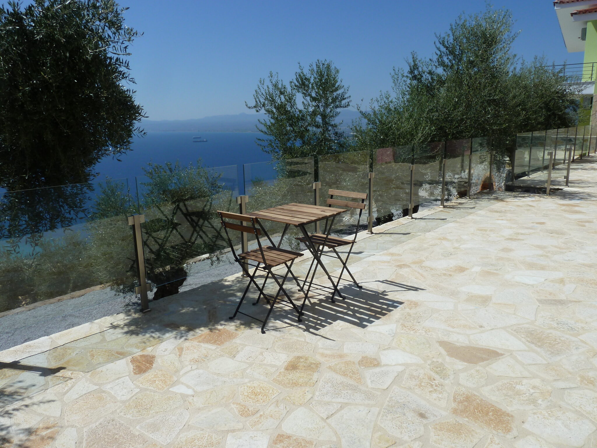 Each 1st floor apartment has a private veranda with sea view and access to a large surrounding garden.